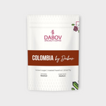 Coffee Community Columbia by Dabov specialty coffee bag with brown sugar, roasted hazelnut, and dried fig notes.