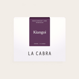 Coffee Community Kenya Kiangoi coffee bag with purple label featuring redcurrant and hibiscus tasting notes
